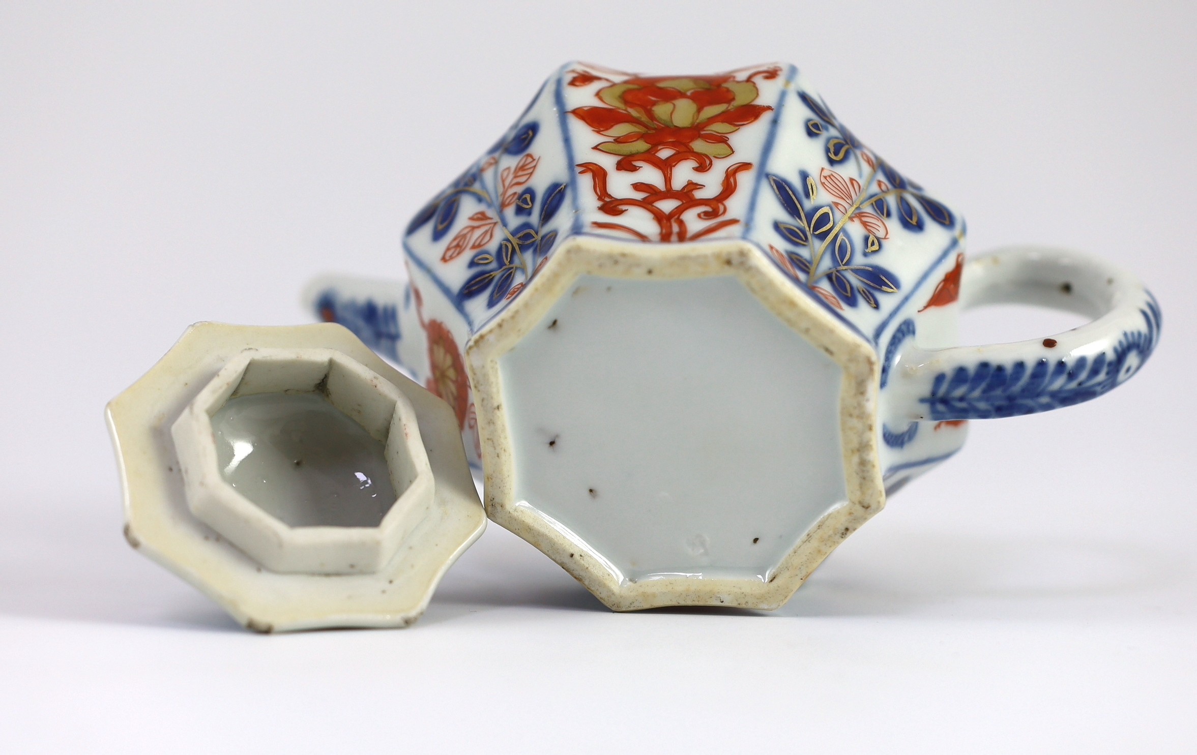A small Chinese Imari octagonal teapot, Kangxi period, 10 cms high, 10.2 cm high, Rim chips